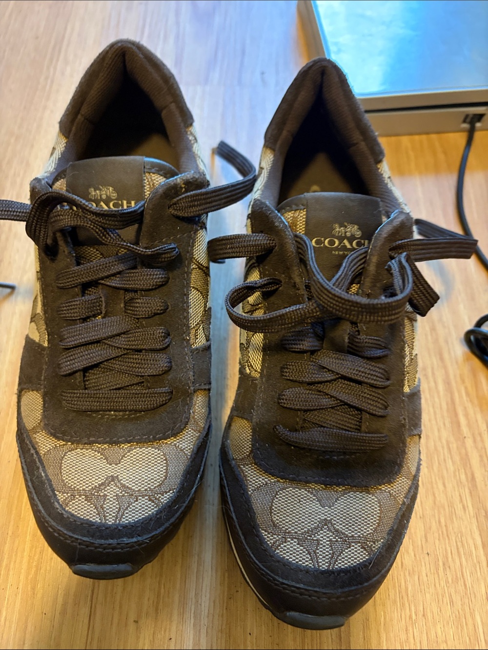 Coach women’s Dark Brown Signature Logo Lace-Up Sneakers